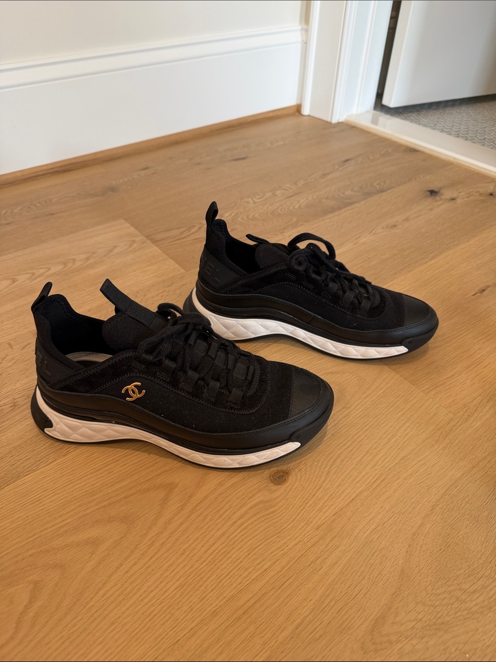 CHANEL Black Sneakers with White Sole and Gold CC